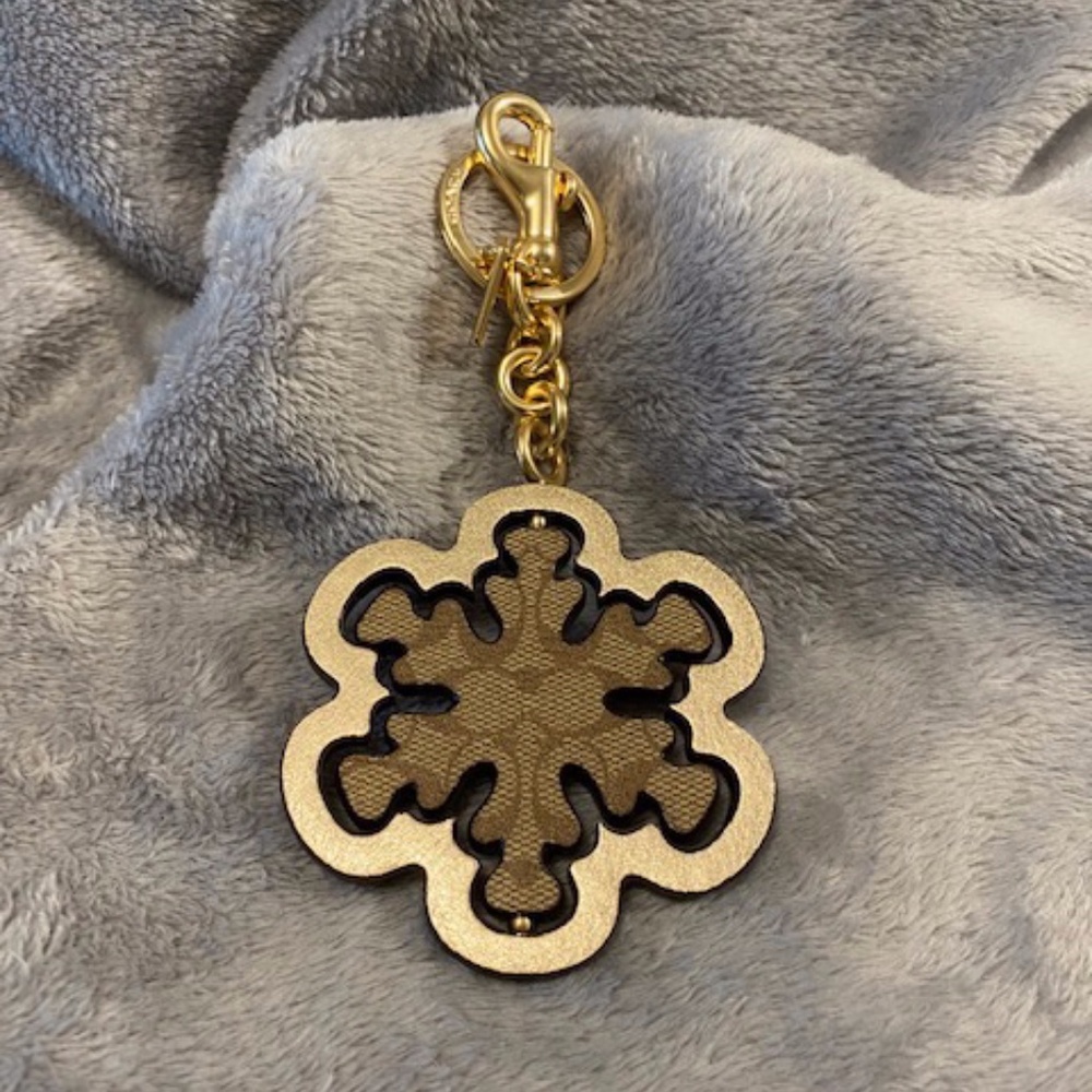 Coach snowflake bag charm